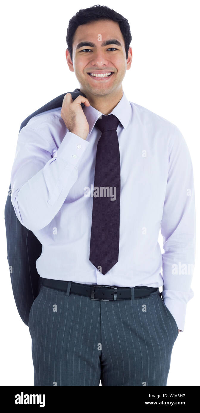 Smiling businessman standing Stock Photo - Alamy