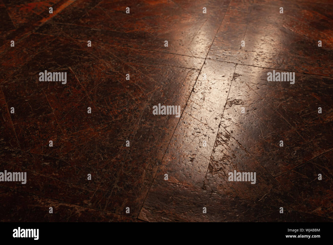 Dark Grungy Parquet Floor With Scratches Over Geometric Pattern