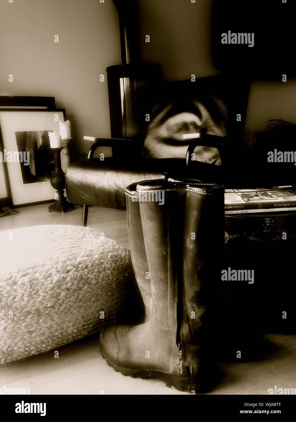 Rubber Boots By Chair At Home Stock Photo Alamy