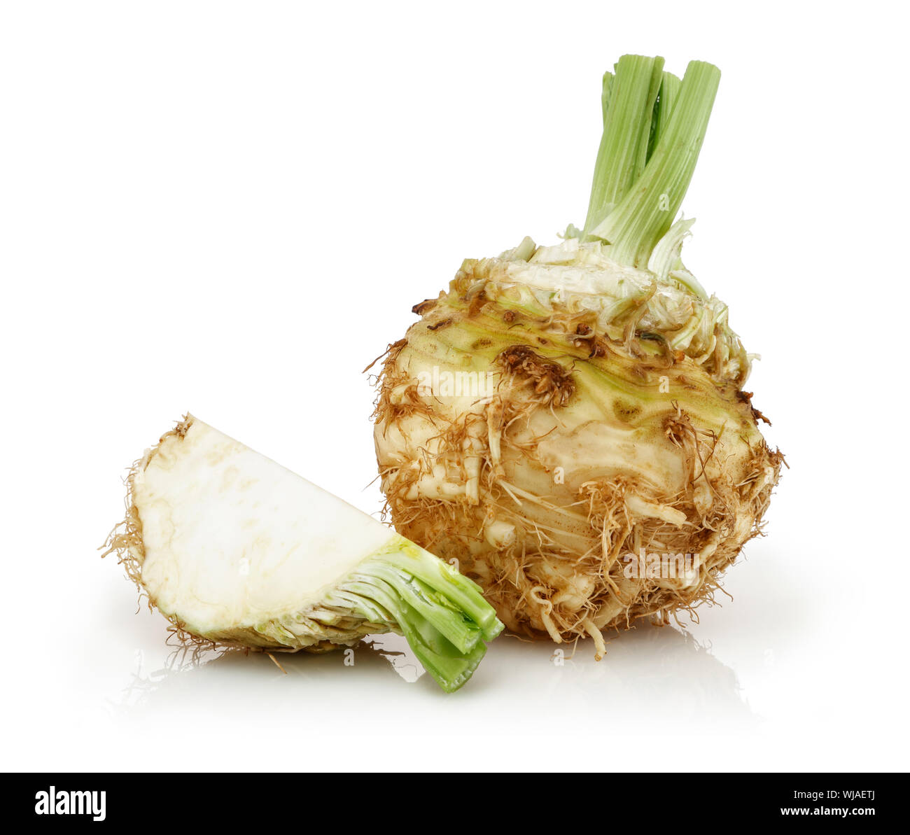 Fresh celeriac root with slice isolated background Stock Photo