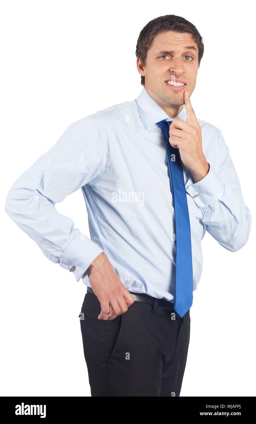 Thinking businessman touching his chin Stock Photo