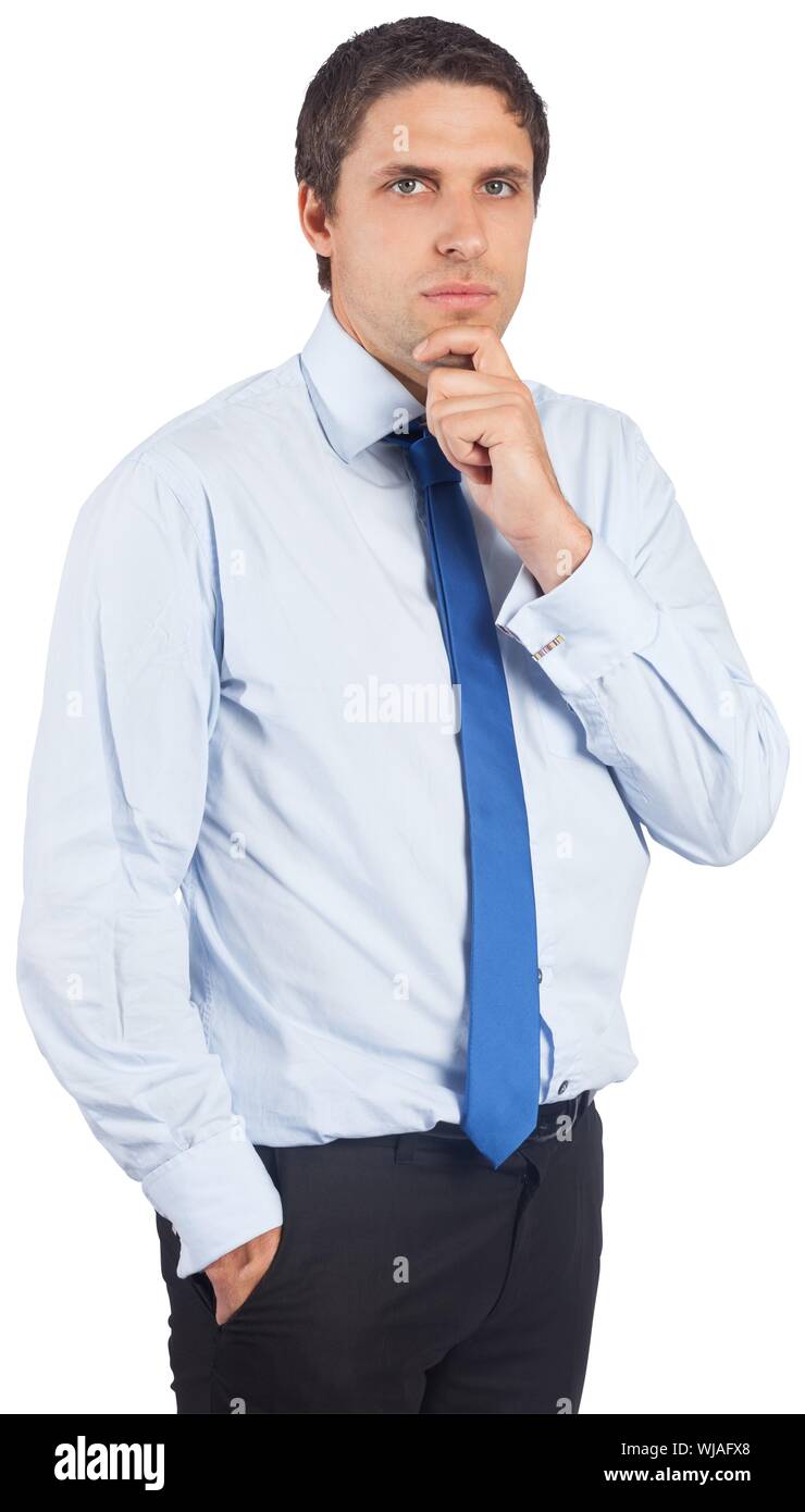 Thinking businessman touching his chin Stock Photo