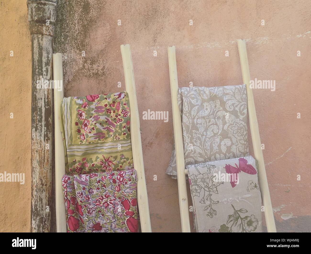 Ladder hanging on wall hires stock photography and images Alamy