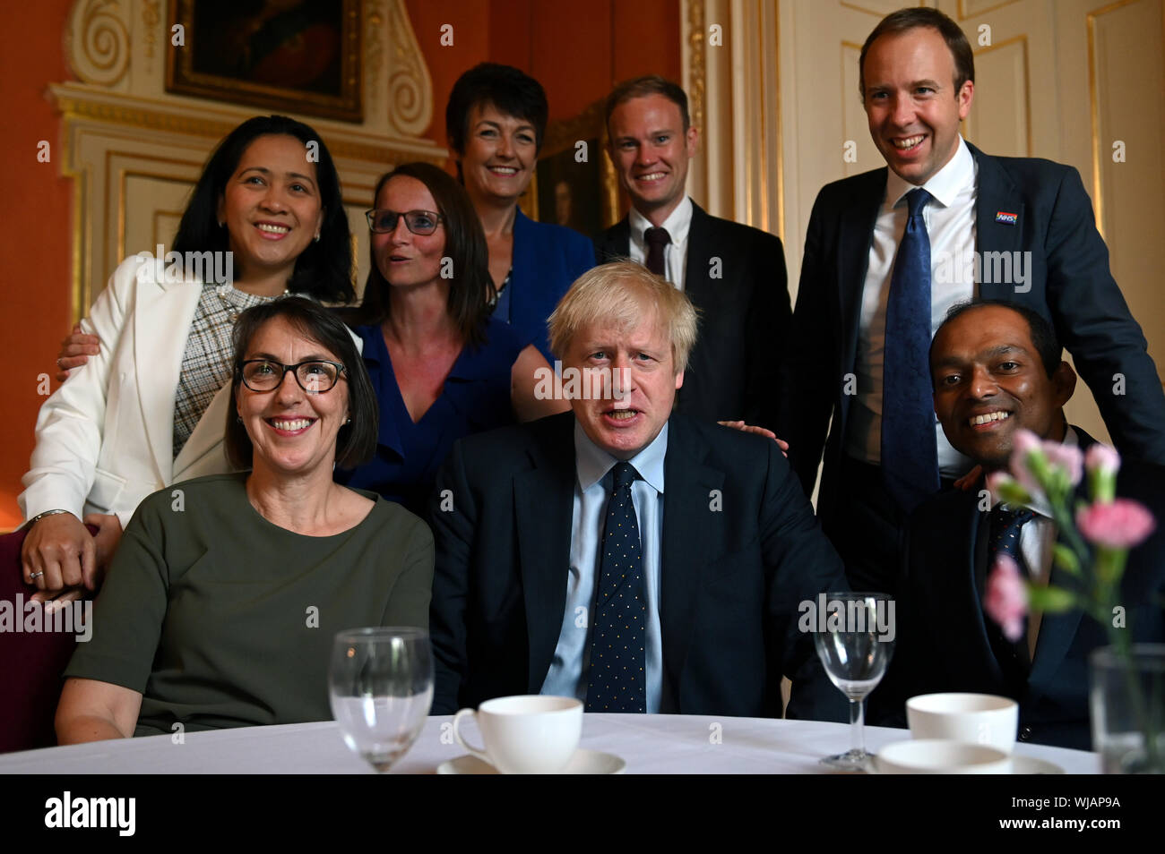 Prime Minister Boris Johnson And Health And Social Care Secretary Matt Hancock Speak With Nhs Workers During A Reception At 10 Downing Street London Stock Photo Alamy