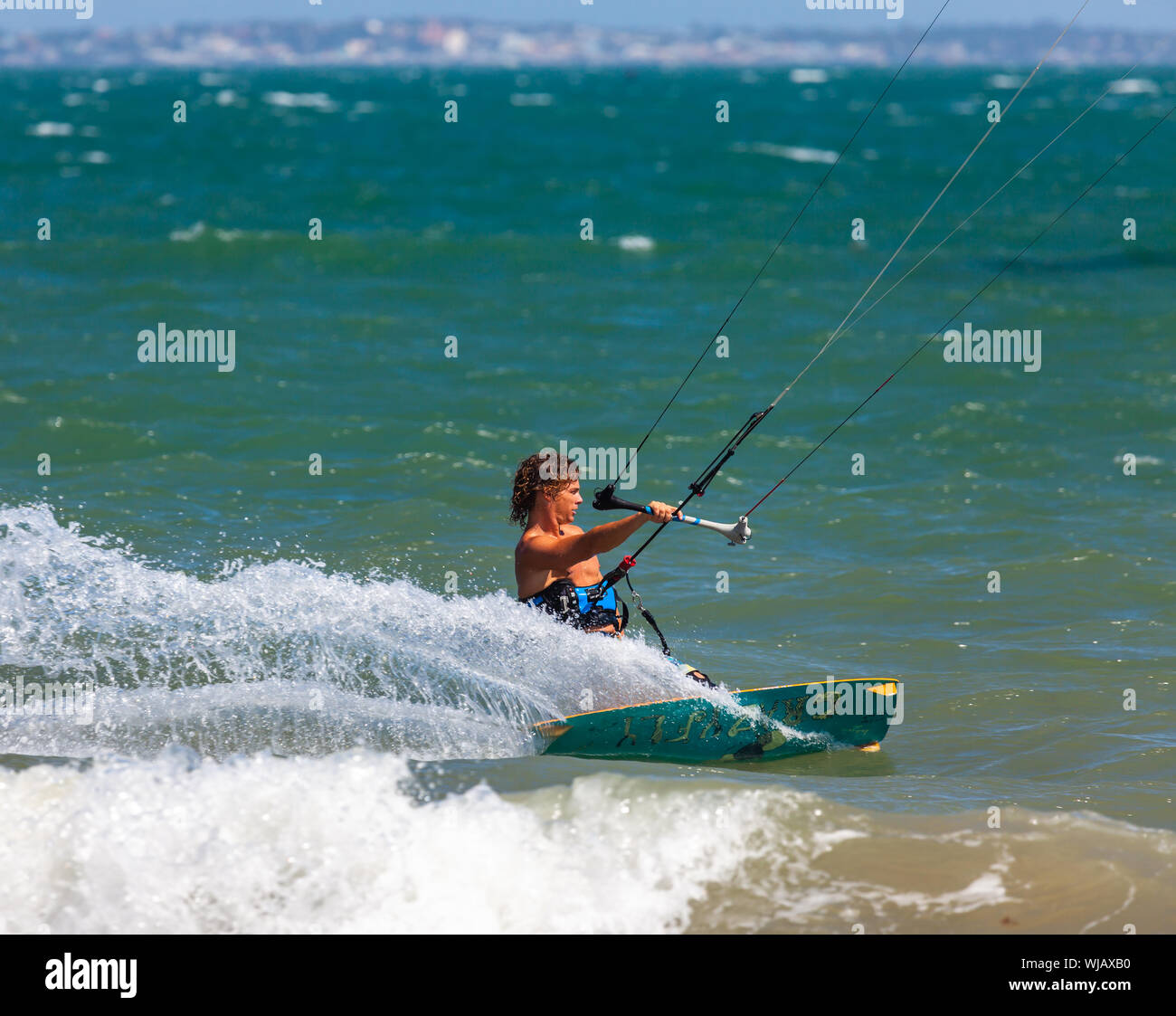 Tricks of professional kitesurfing athletes Stock Photo