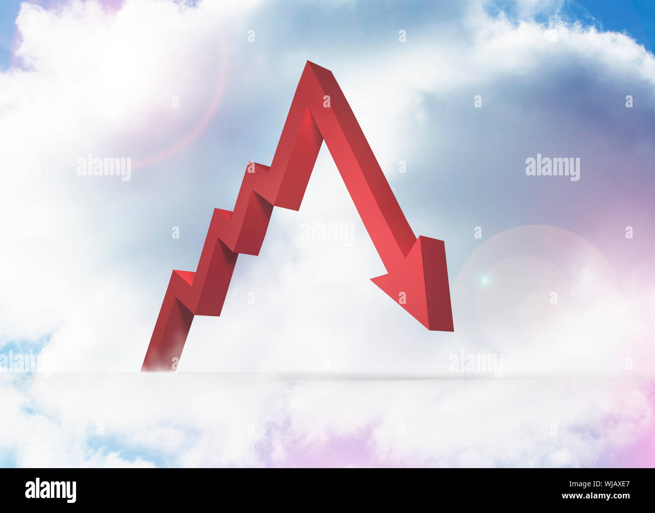 Red arrow pointing against sky Stock Photo