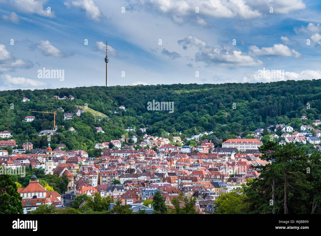 Germany, Cityscape stuttgart of red roofs of houses in basin surrounded ...