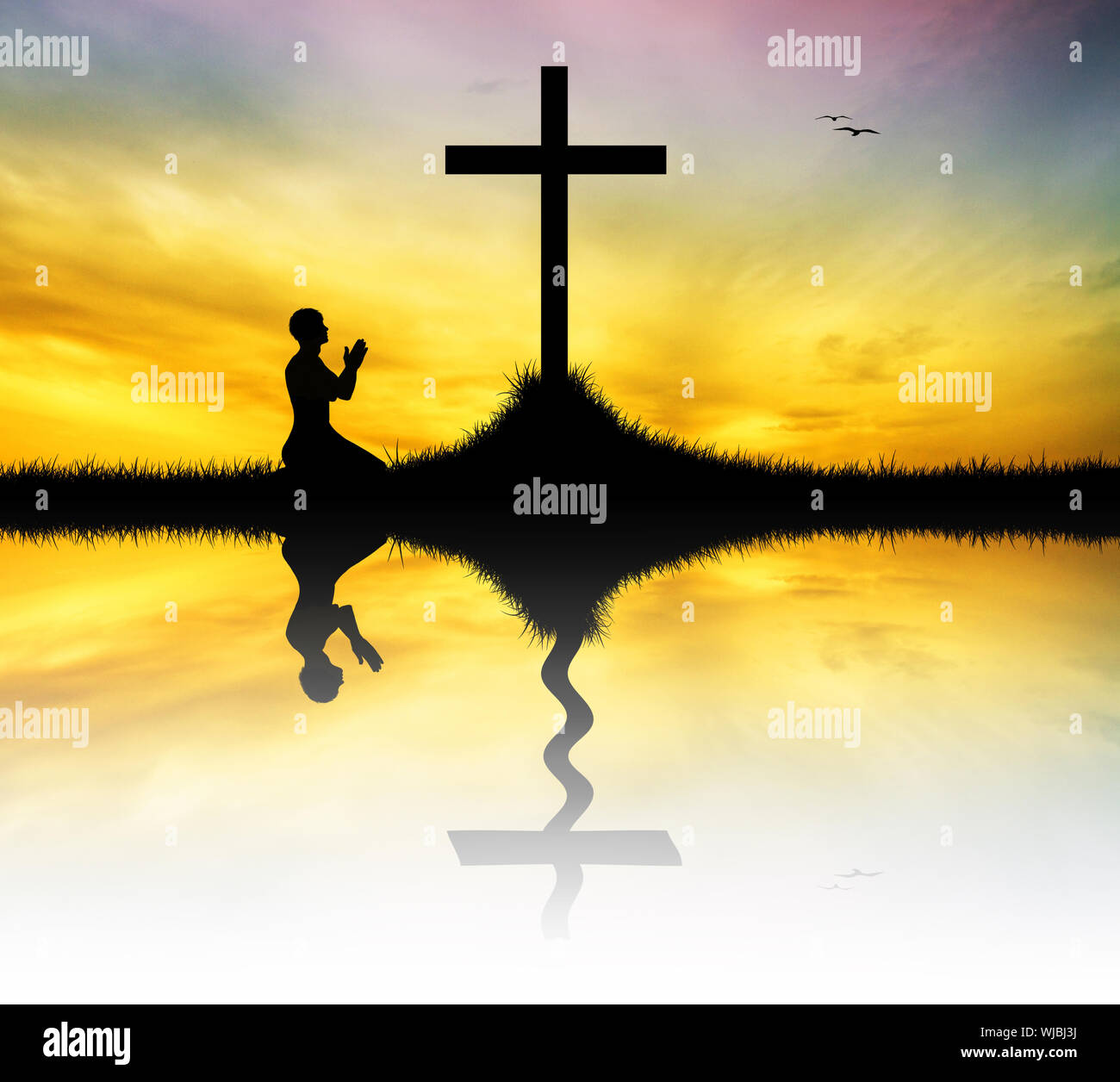 Man prays jesus cross faith hi-res stock photography and images - Alamy