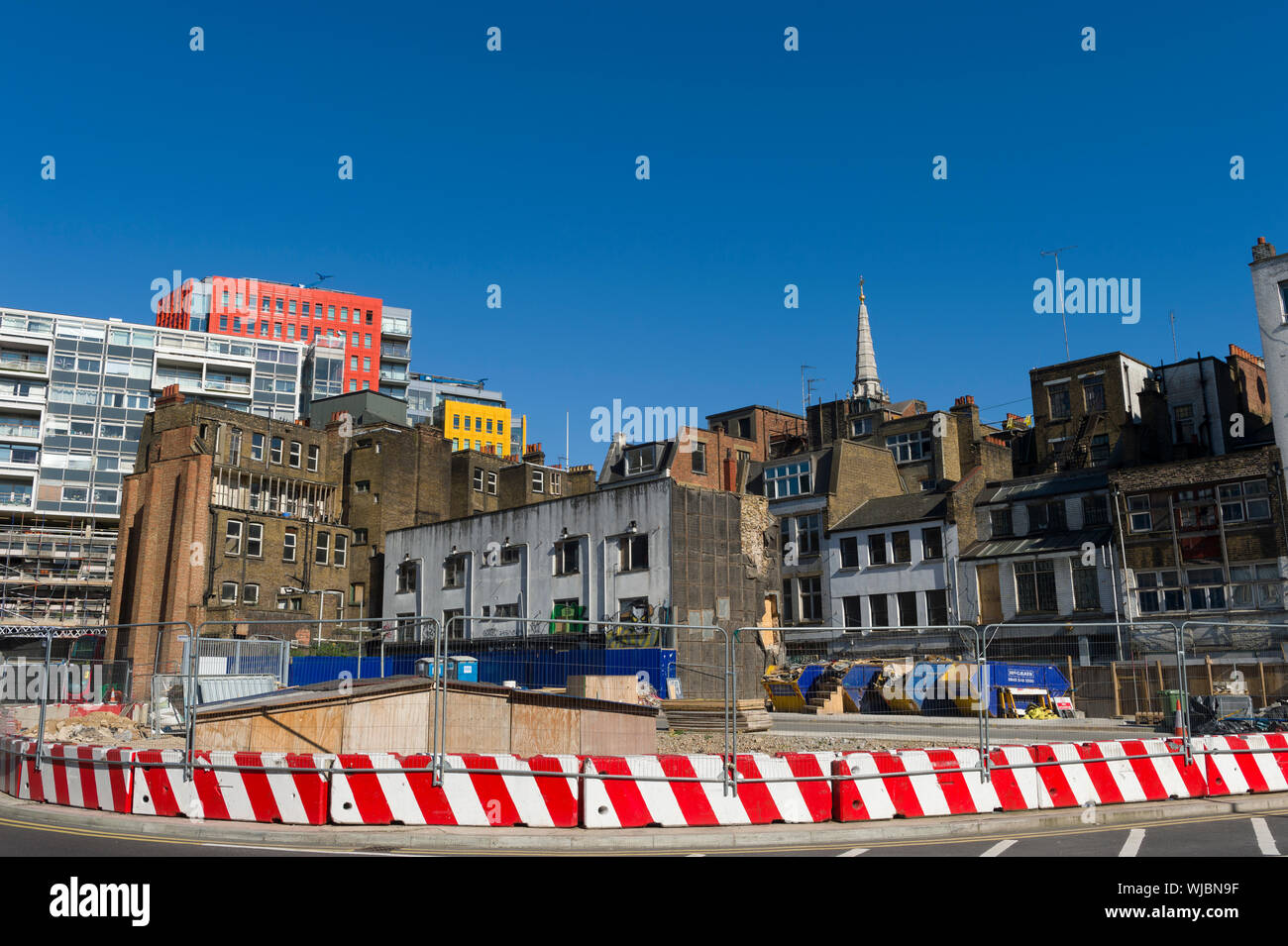 Building work due to Cross Rail, reveal a new view of the colourful building of  Central Saint Giles, which where designed by the Italian architect Re Stock Photo