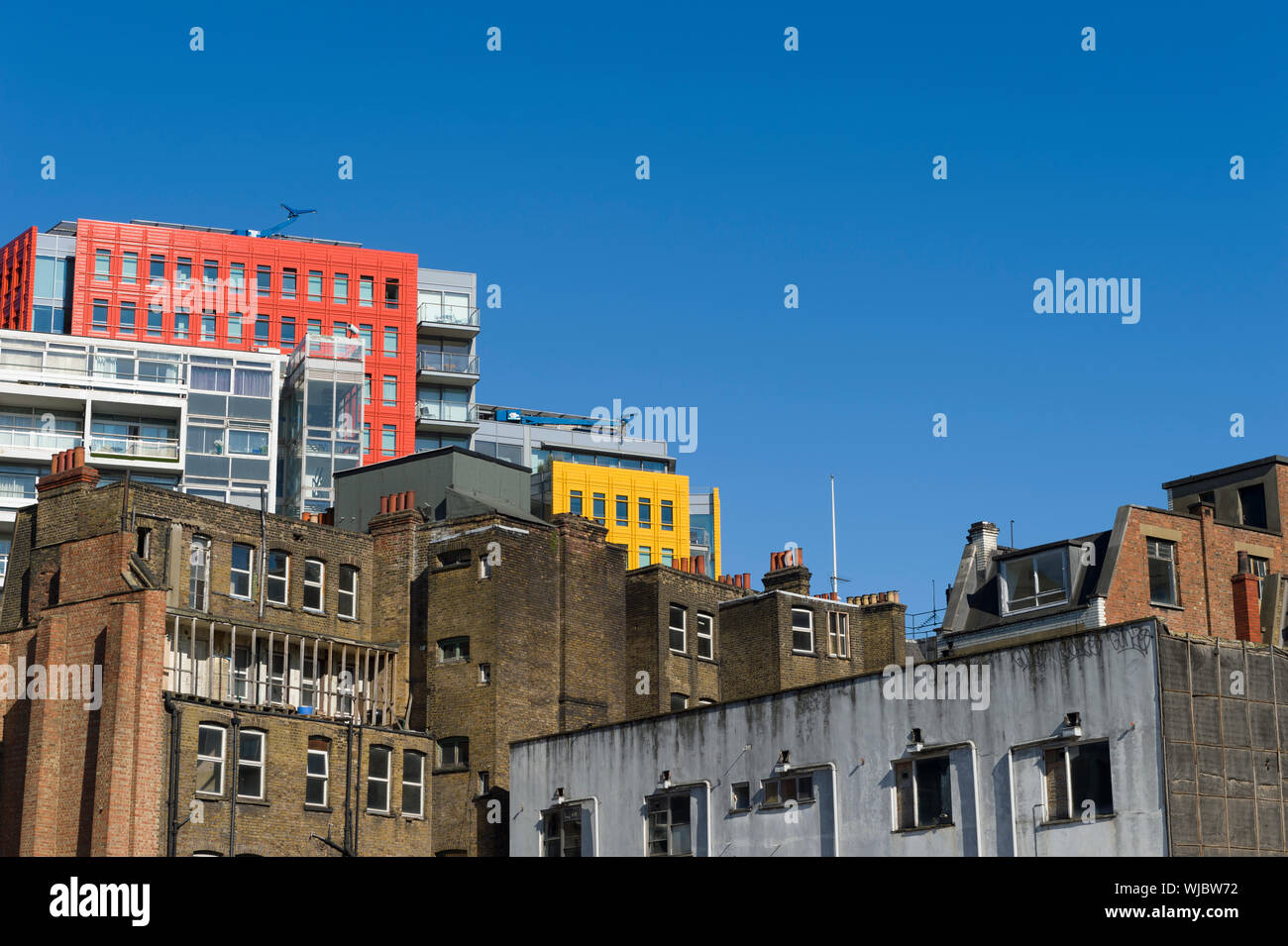 Building work due to Cross Rail, reveal a new view of the colourful building of  Central Saint Giles, which where designed by the Italian architect Re Stock Photo