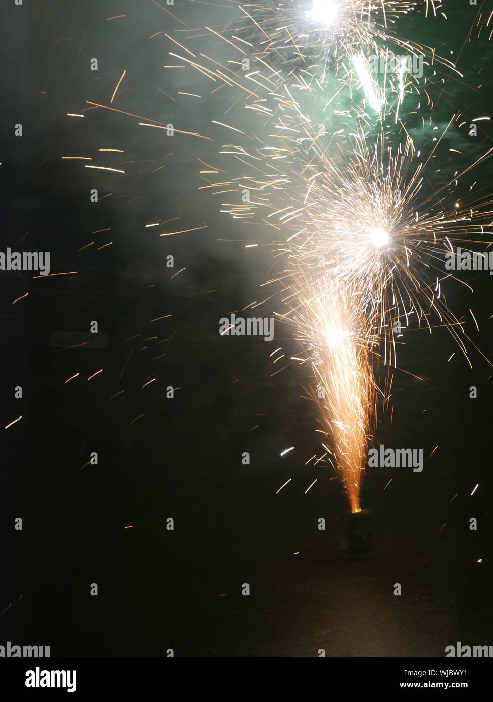 Exploding Firework At Night Stock Photo