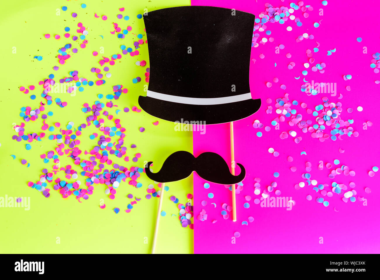 Icon of gentleman. Design with mustache and black hat on bright background with multicolored confetti. Flat design.Invitation on party or Happy Father's Day greeting card. Stock Photo