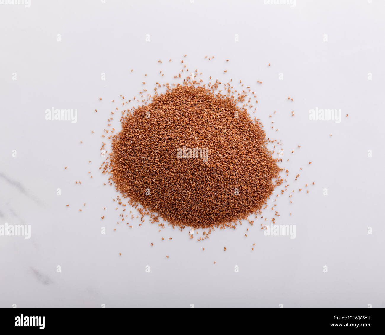 Teff grain piled and seen from above Stock Photo
