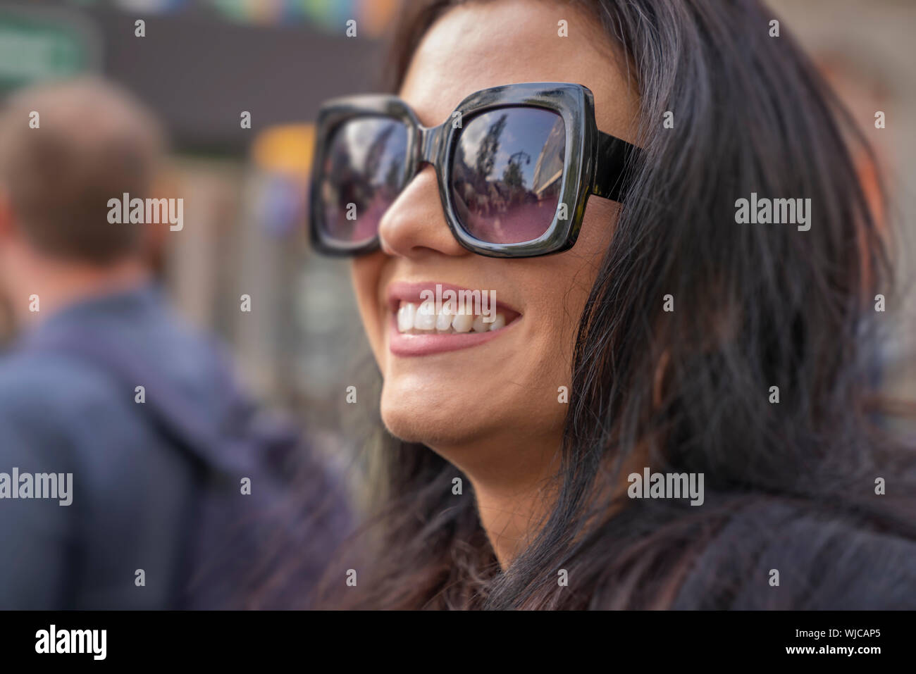 Woman wearing sunglasses, Menningarnott or Cultural day, Reykjavik, Iceland Stock Photo