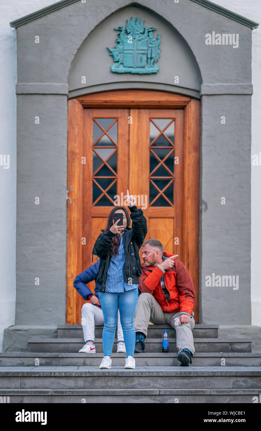 Taking a picture with a smart phone, Menningarnott or Cultural day, Reykjavik, Iceland. Stock Photo