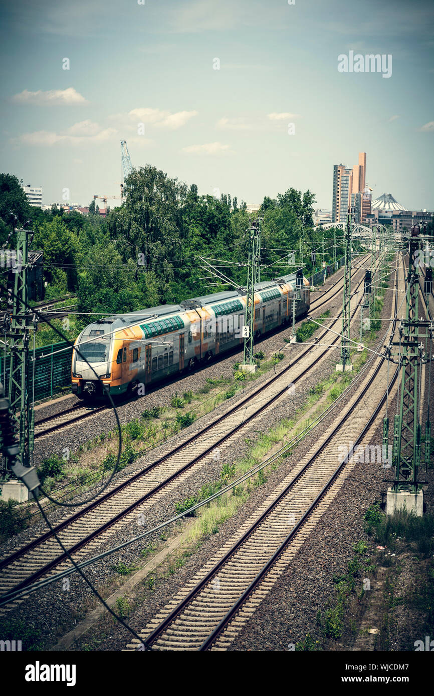 railroad and train with Potsdamer Platz in background,, Berlin Stock