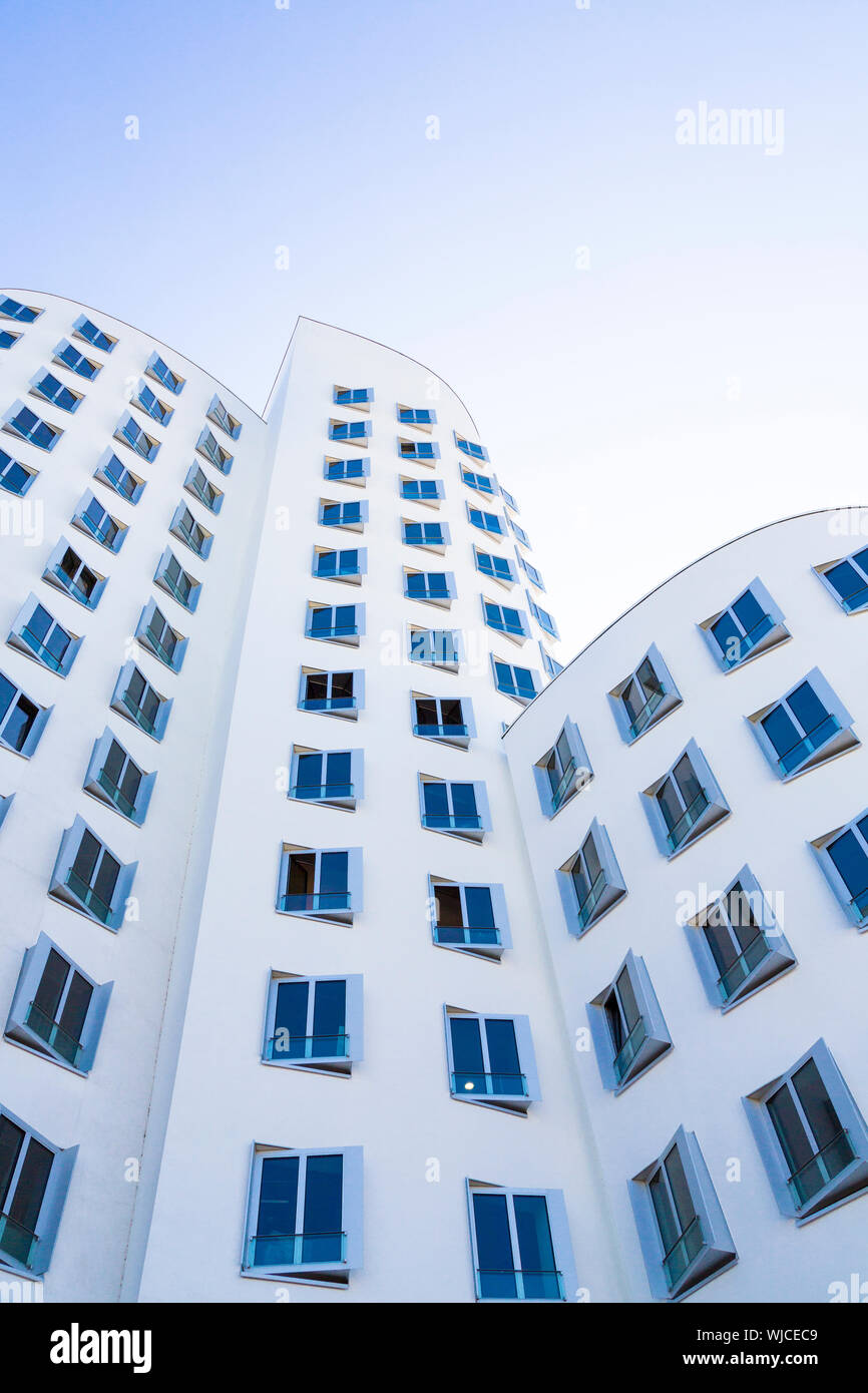 white house with blue windows, modern architecture Stock Photo - Alamy