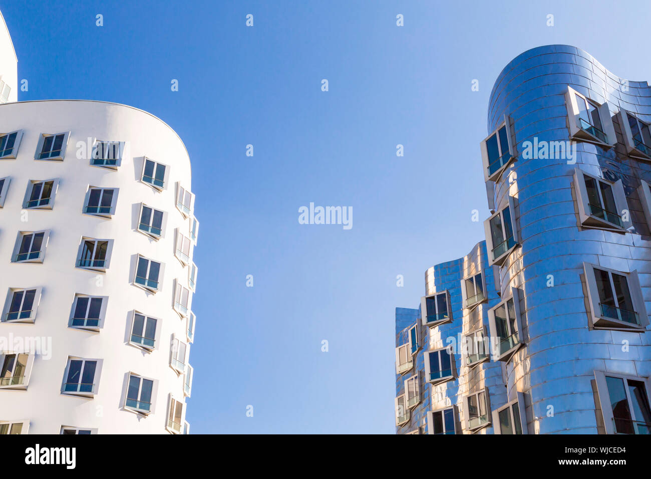 white house with blue windows, modern architecture Stock Photo - Alamy