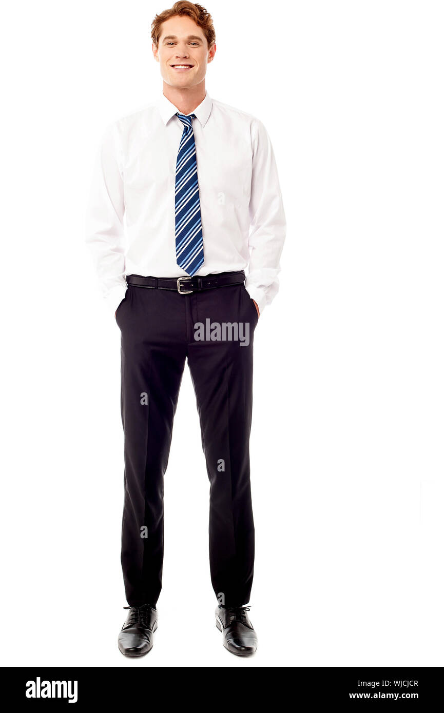 Handsome corporate guy posing confidently Stock Photo