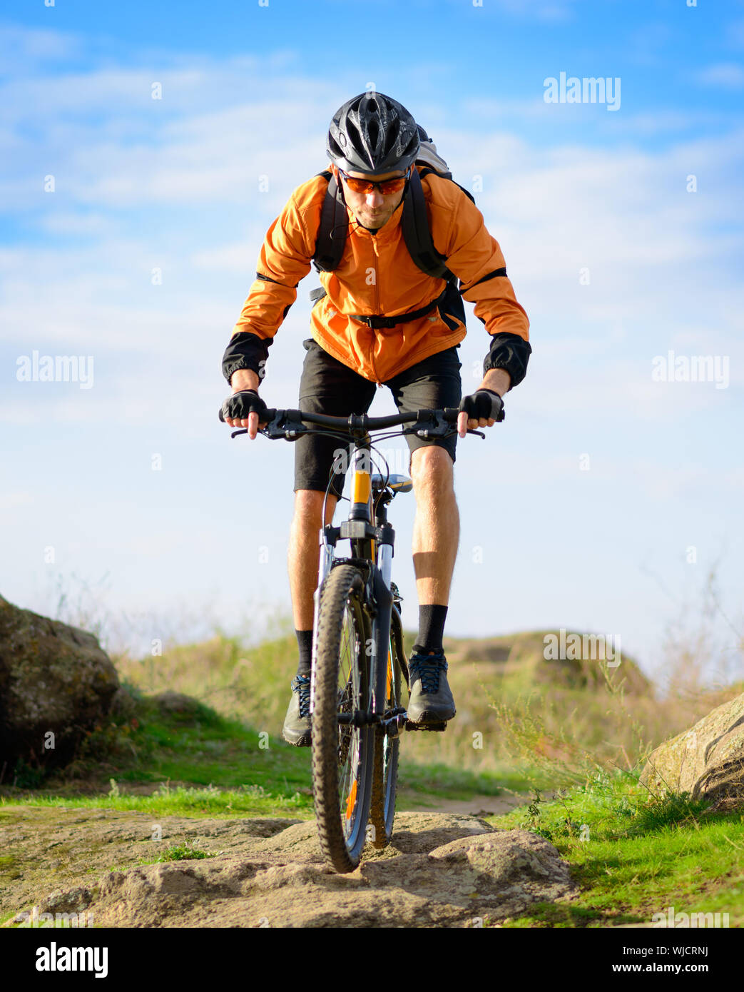 Cyclist Riding the Bike on the Beautiful Spring Mountain Trail Stock ...