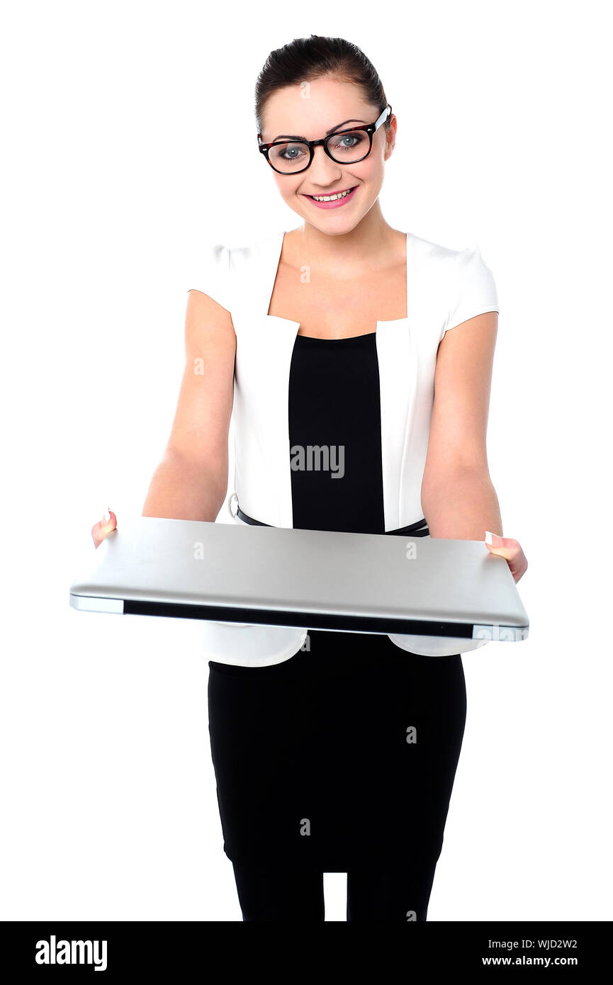 Corporate lady showing laptop to camera Stock Photo