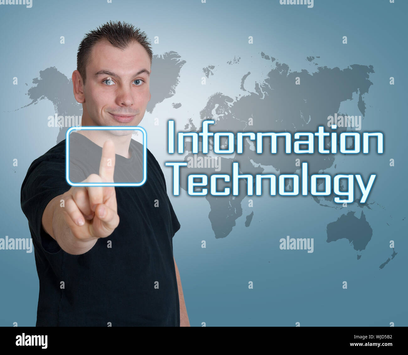 Young man press digital Information Technology button on interface in front of him Stock Photo