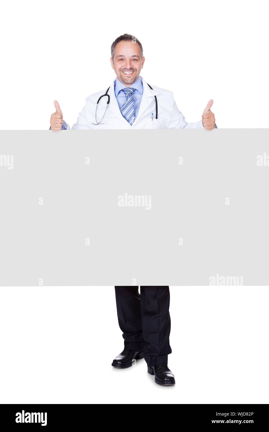 Portrait Of A Doctor Holding Blank Placard Stock Photo