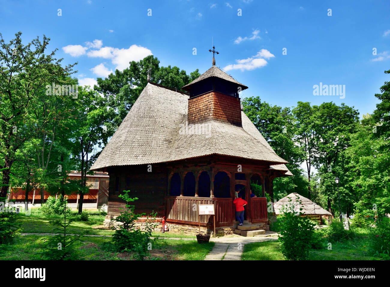 Saint Voivods wooden church, Rapciuni. The National Village Museum, showcasing 272 authentic peasant farms and houses from Romania. Bucharest Stock Photo