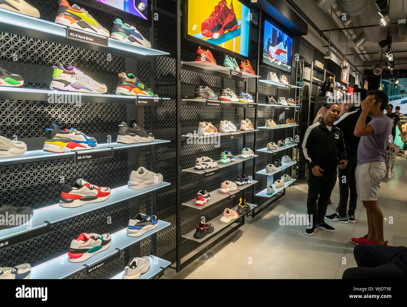 Shoppers and visitors flock to the newly opened Puma flagship store on  Fifth Avenue in New York on Thursday, August 29, 2019. The 18,000 square  foot, two level store is Puma's first