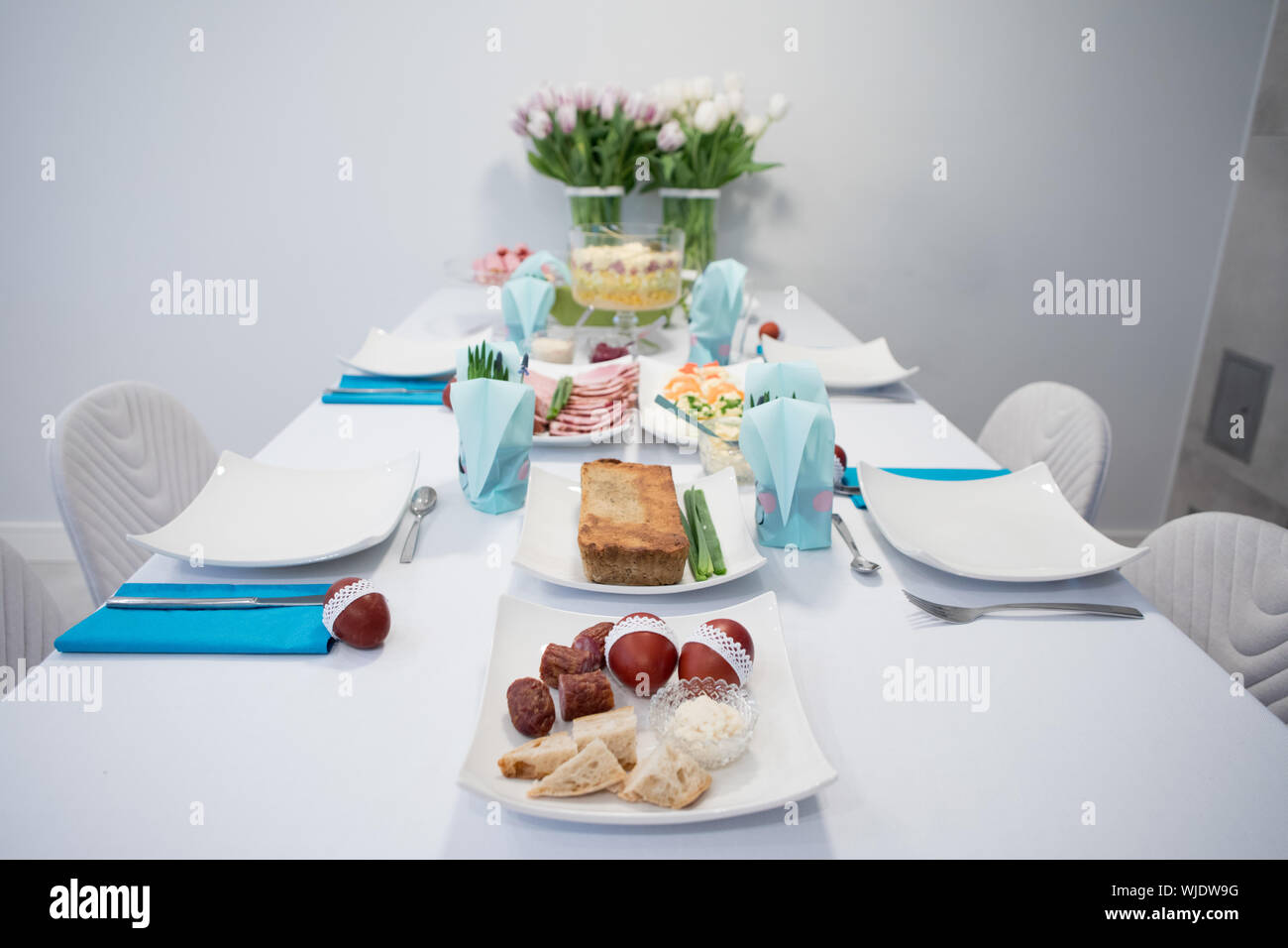 Traditional, polish Easter table with colored eggs, boiled eggs Stock Photo
