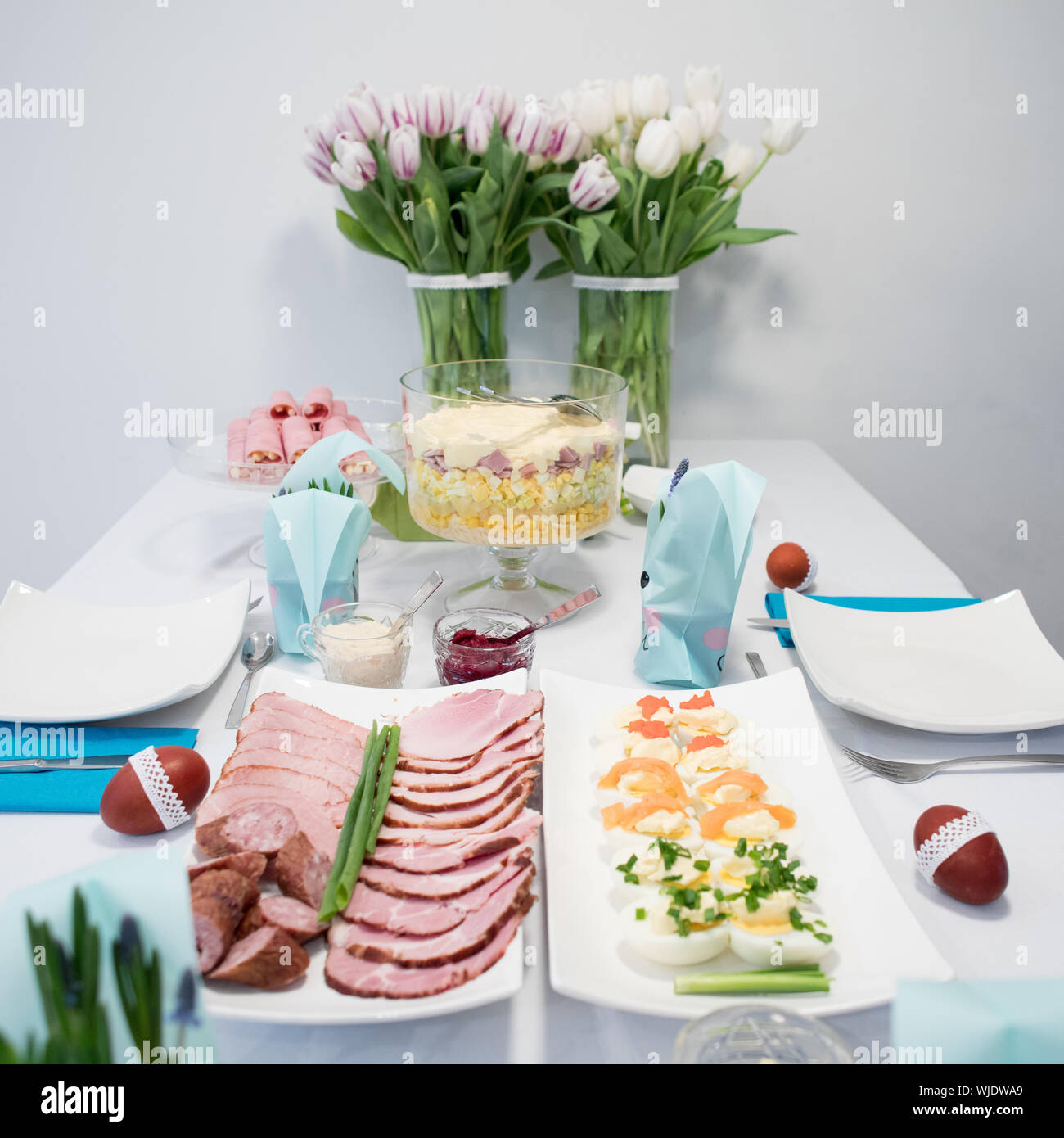 Traditional, polish Easter table with colored eggs, boiled eggs Stock Photo