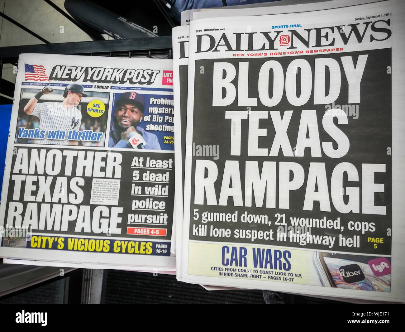 Front pages of New York newspapers on Sunday, September 1, 2019 report on the previous days’ mass shooting Midland and Odessa, TX. (© Richard B. Levine) Stock Photo