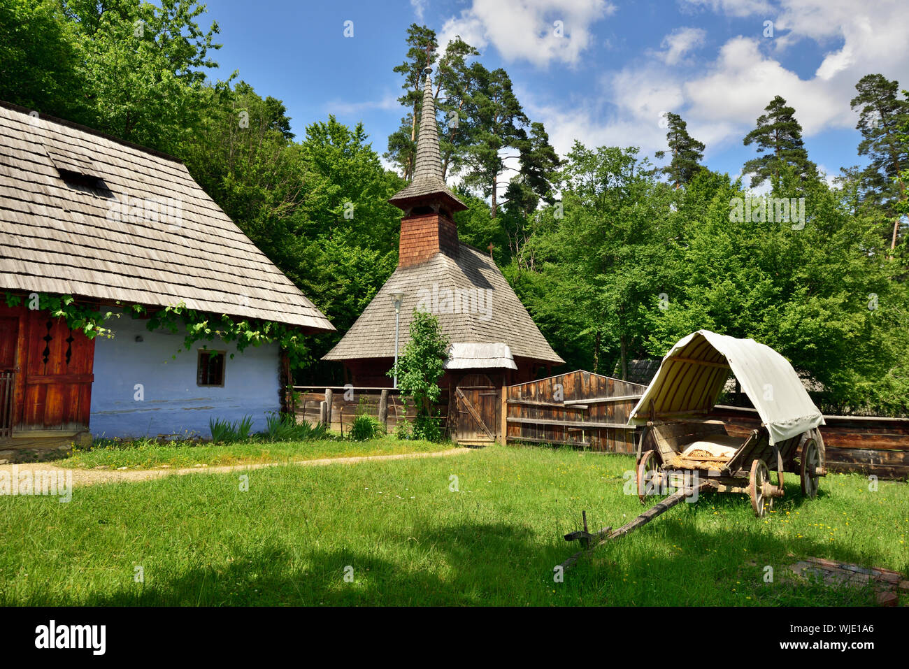 Wooden church dating back to the 17th century and farm from Dretea, Cluj county. ASTRA Museum of Traditional Folk Civilization, an open-air museum out Stock Photo