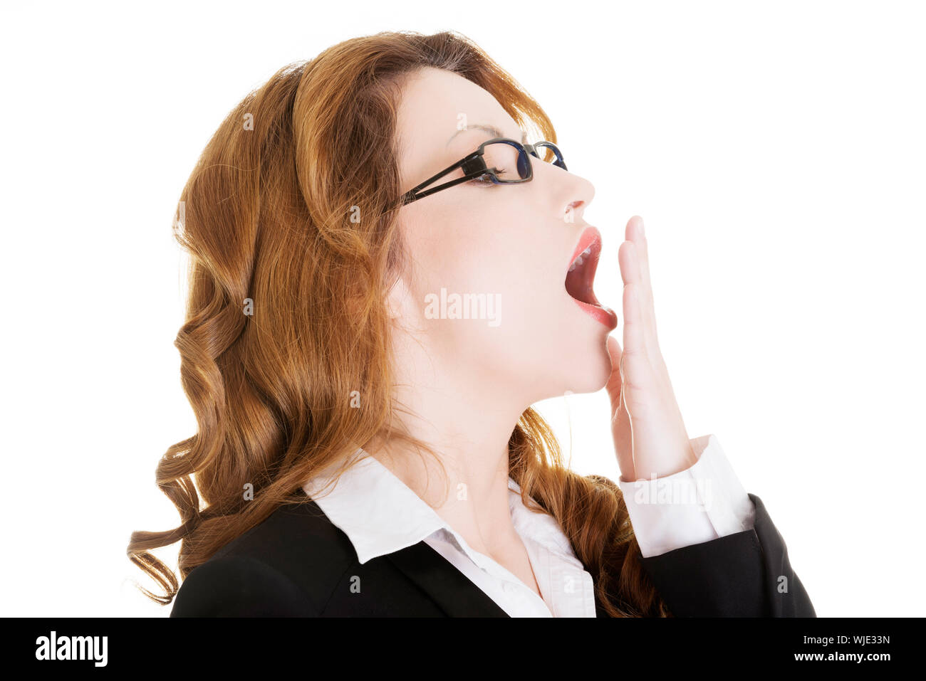 Tired business woman in a suit ,isolated over white background Stock ...