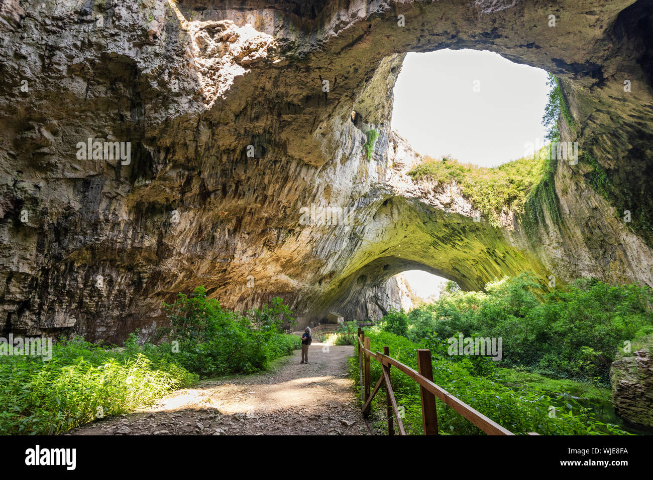 Devetashka cave is a large karst cave near Lovech. It has been occupied by Neanderthal and Homo sapiens for thousands of years.  Bulgaria Stock Photo