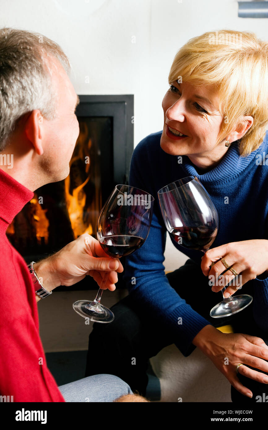 Couple drinking red wine Stock Photo - Alamy