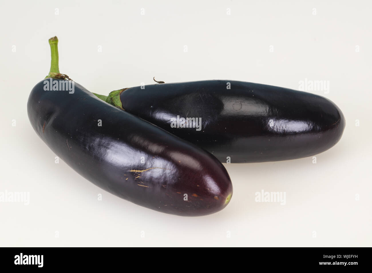 Ripe Eggplant isolated on white background Stock Photo Alamy