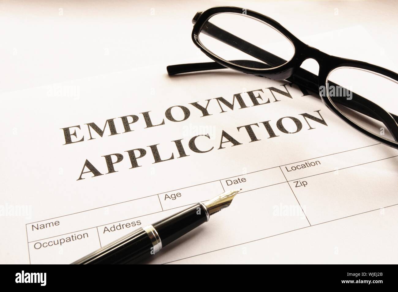 employment application form on desk showing job search concept Stock ...