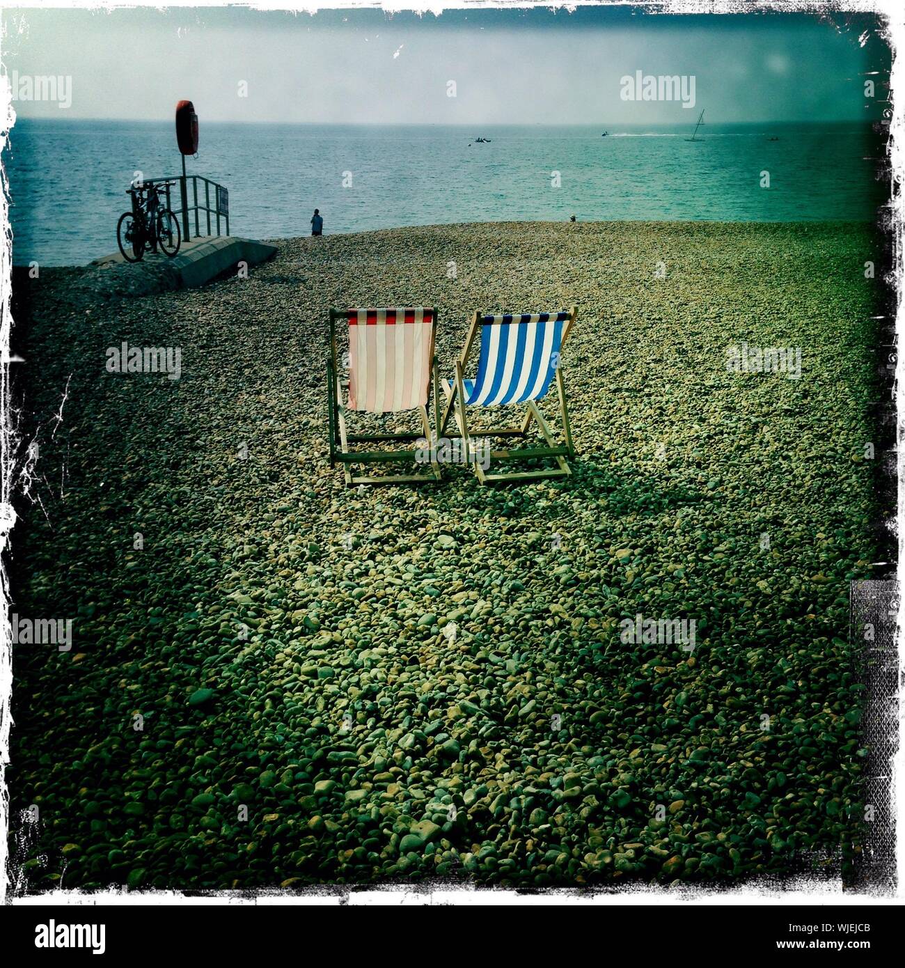 Two striped deck chairs hi-res stock photography and images - Alamy