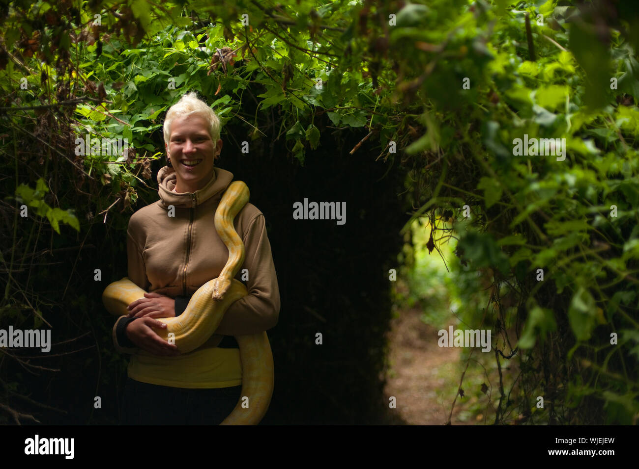 Snake wrapped around hi-res stock photography and images - Alamy