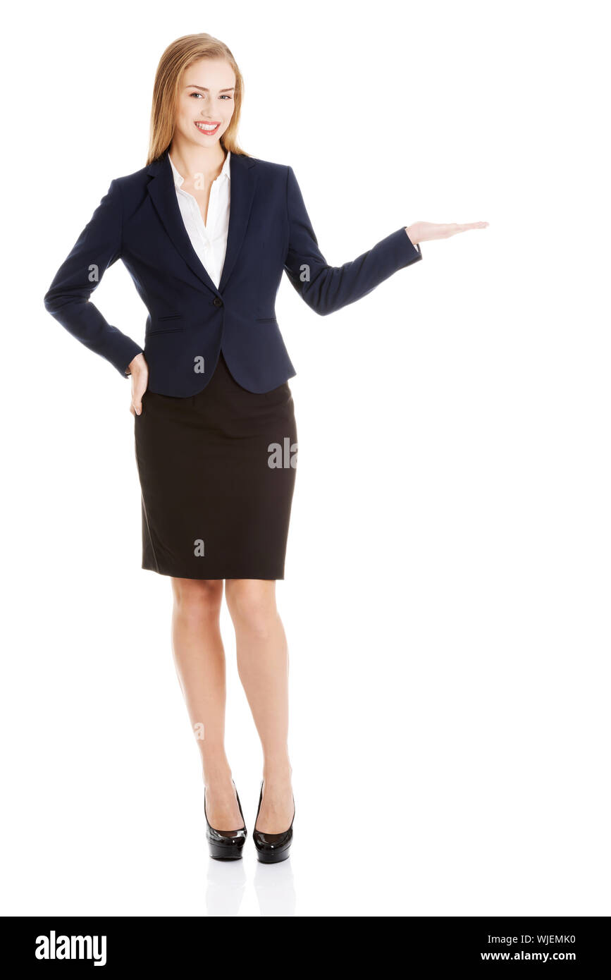 Beautiful business woman showing copy space on palms. Isolated on white ...