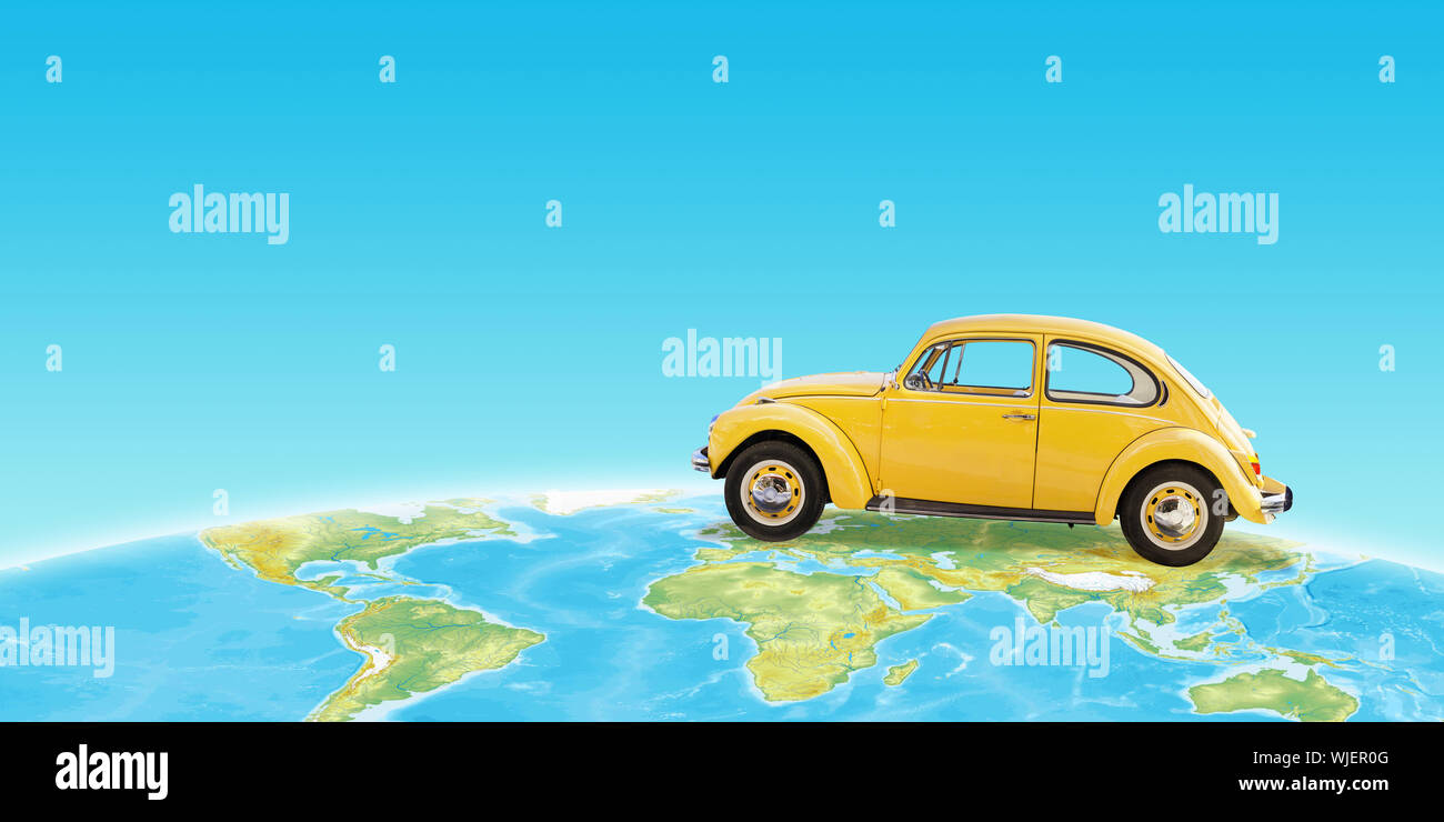 Old timer car on world map. Copy space beside. Concept of travel. Stock Photo