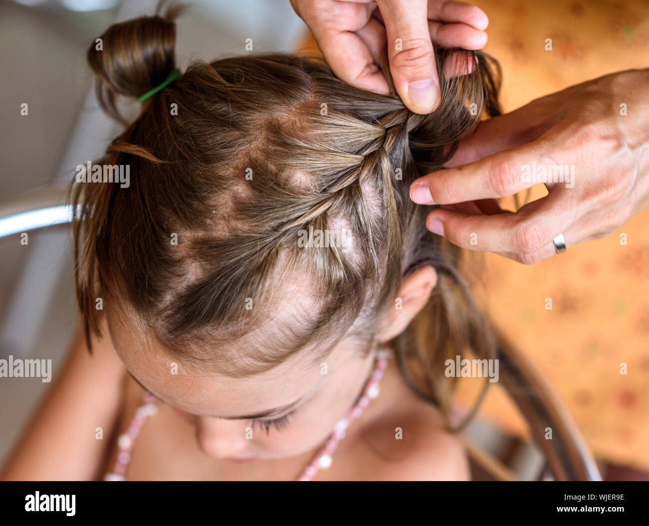 Girls braiding hair hi-res stock photography and images - Page 3 - Alamy