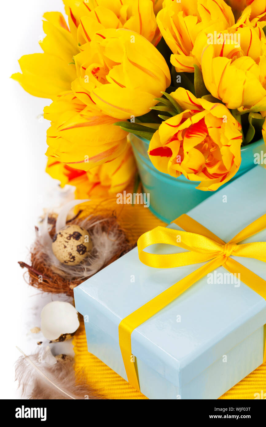 spring tulips with easter eggs on white background Stock Photo - Alamy