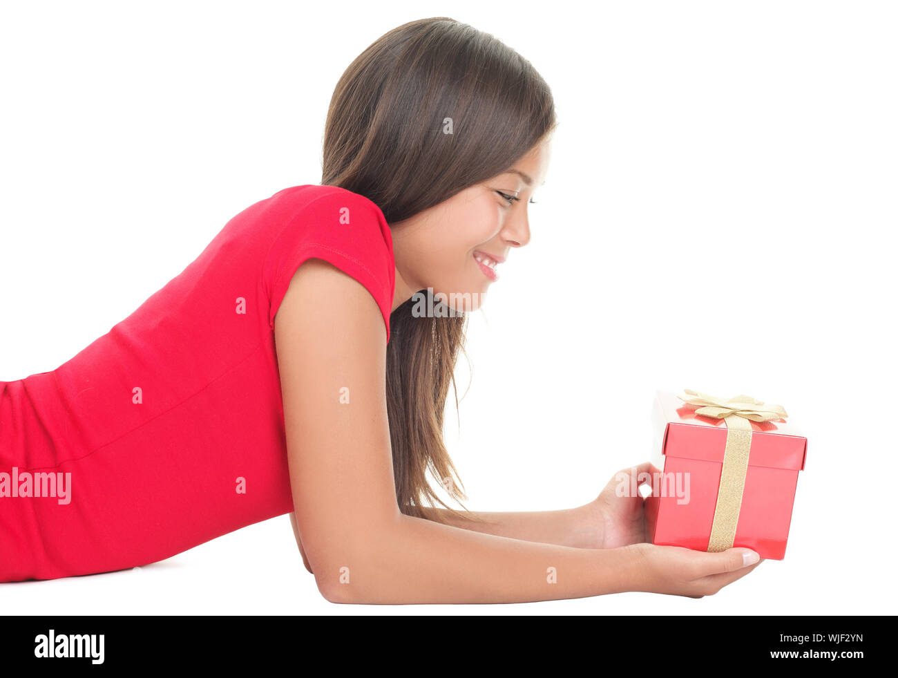 Woman holding gift isolated Stock Photo