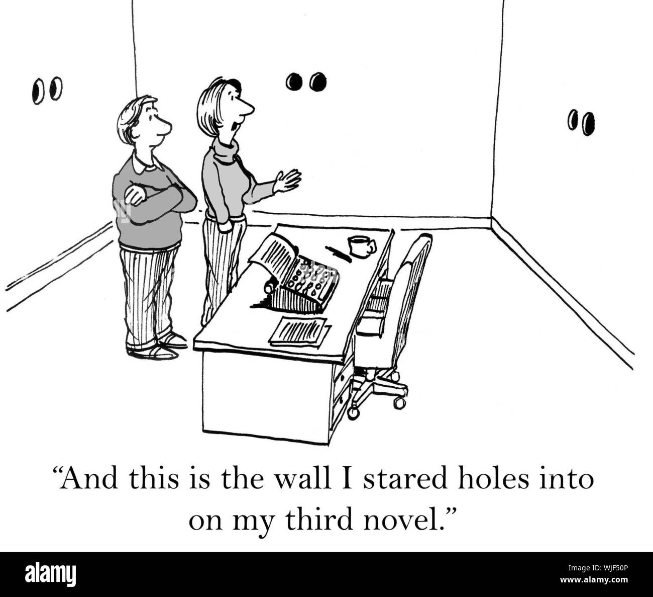 'And this is the wall I stared holes into on my third novel.' Stock Photo
