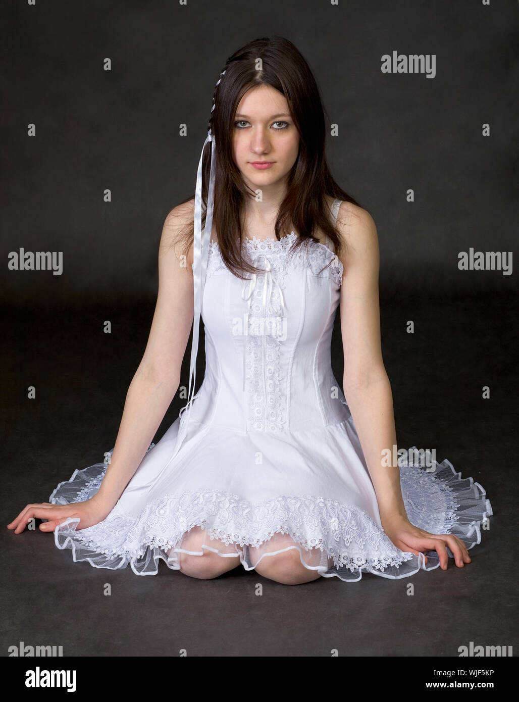 Woman kneel dress girl hi-res stock photography and images - Alamy