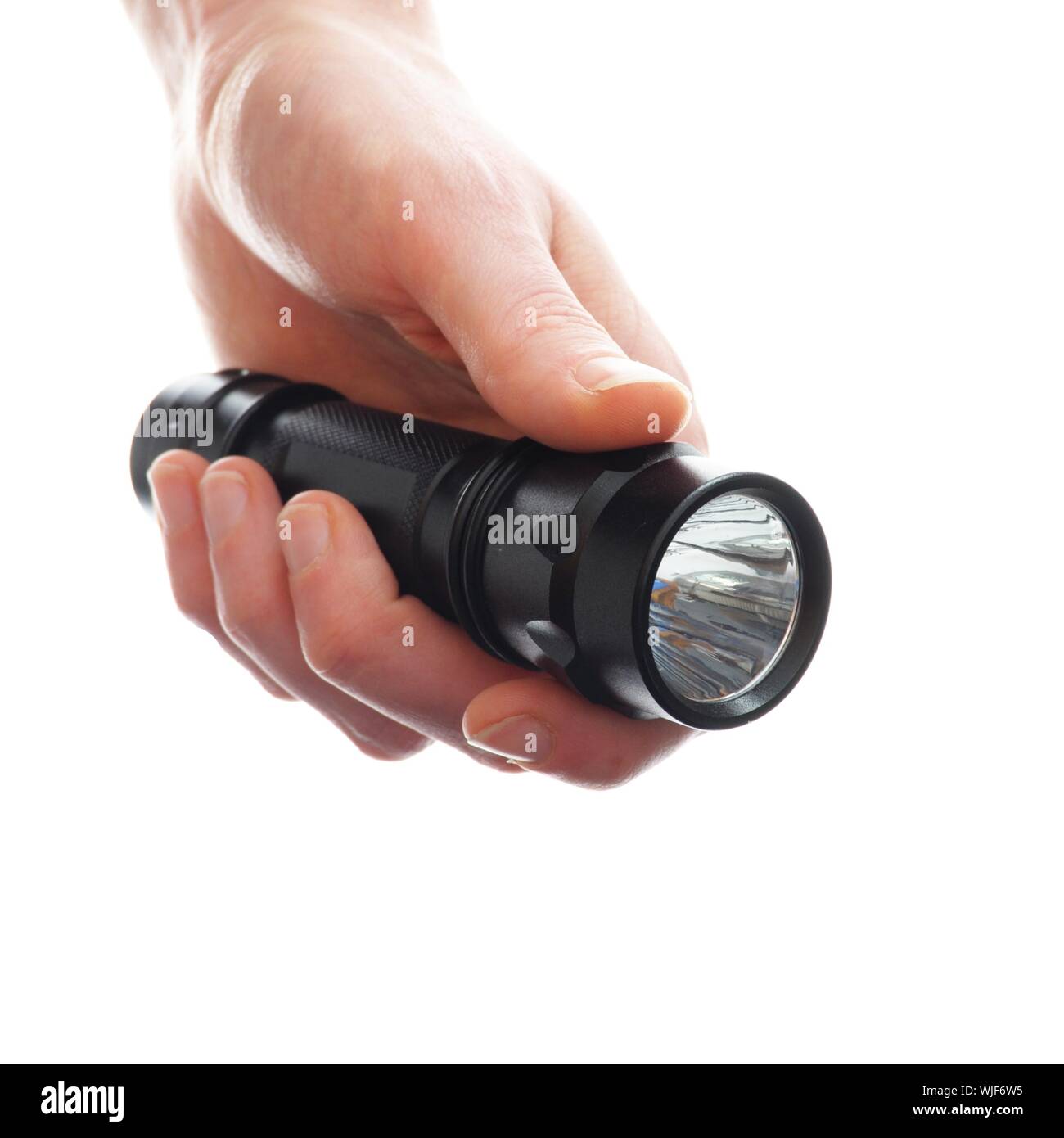 hand holding flashlight isolated on a white background Stock Photo Alamy