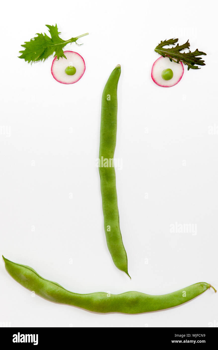 High Angle View Of Anthropomorphic Face Made From Various Vegetable Stock Photo