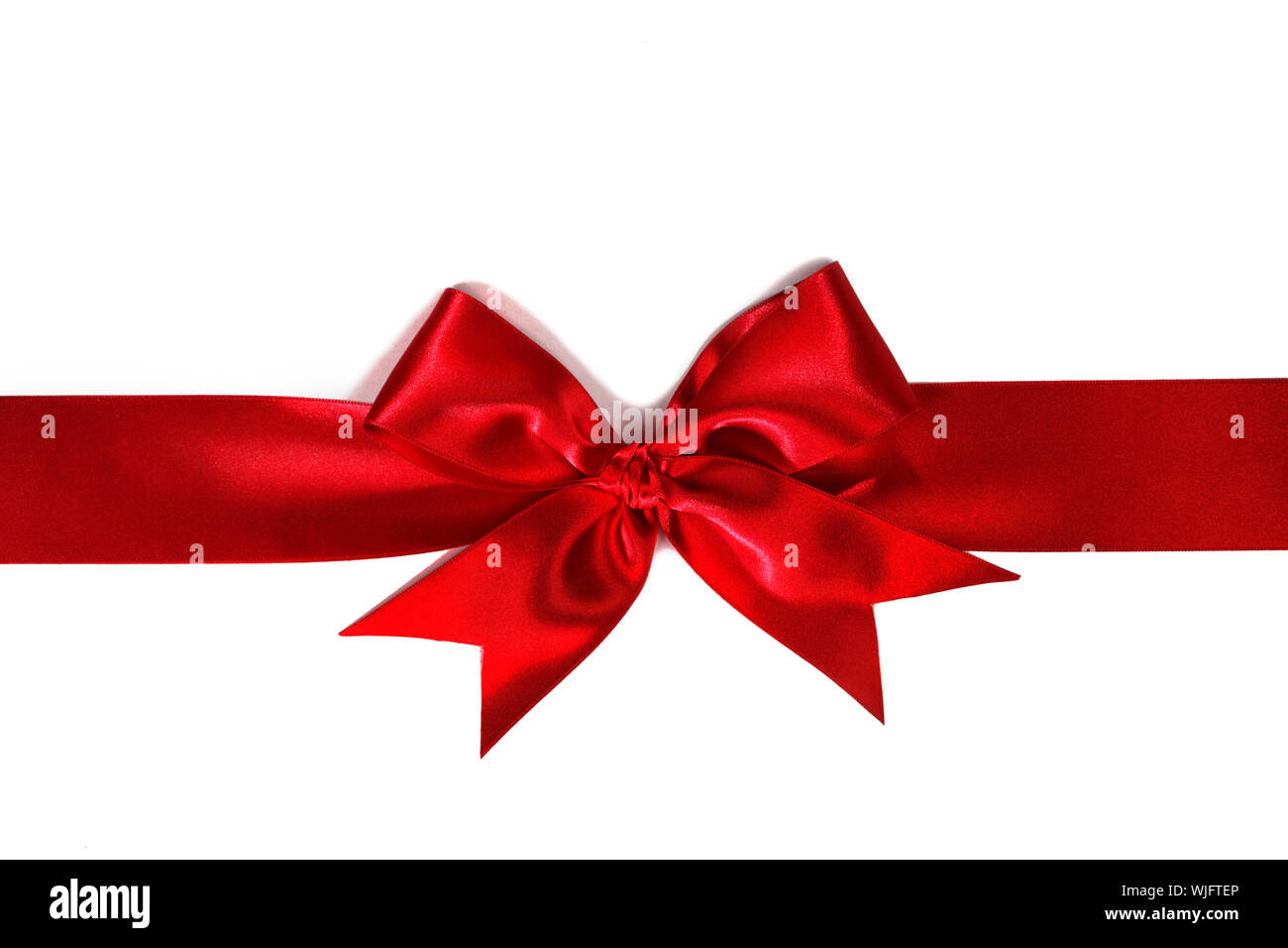 Red ribbon with bow isolated on white background Stock Photo - Alamy